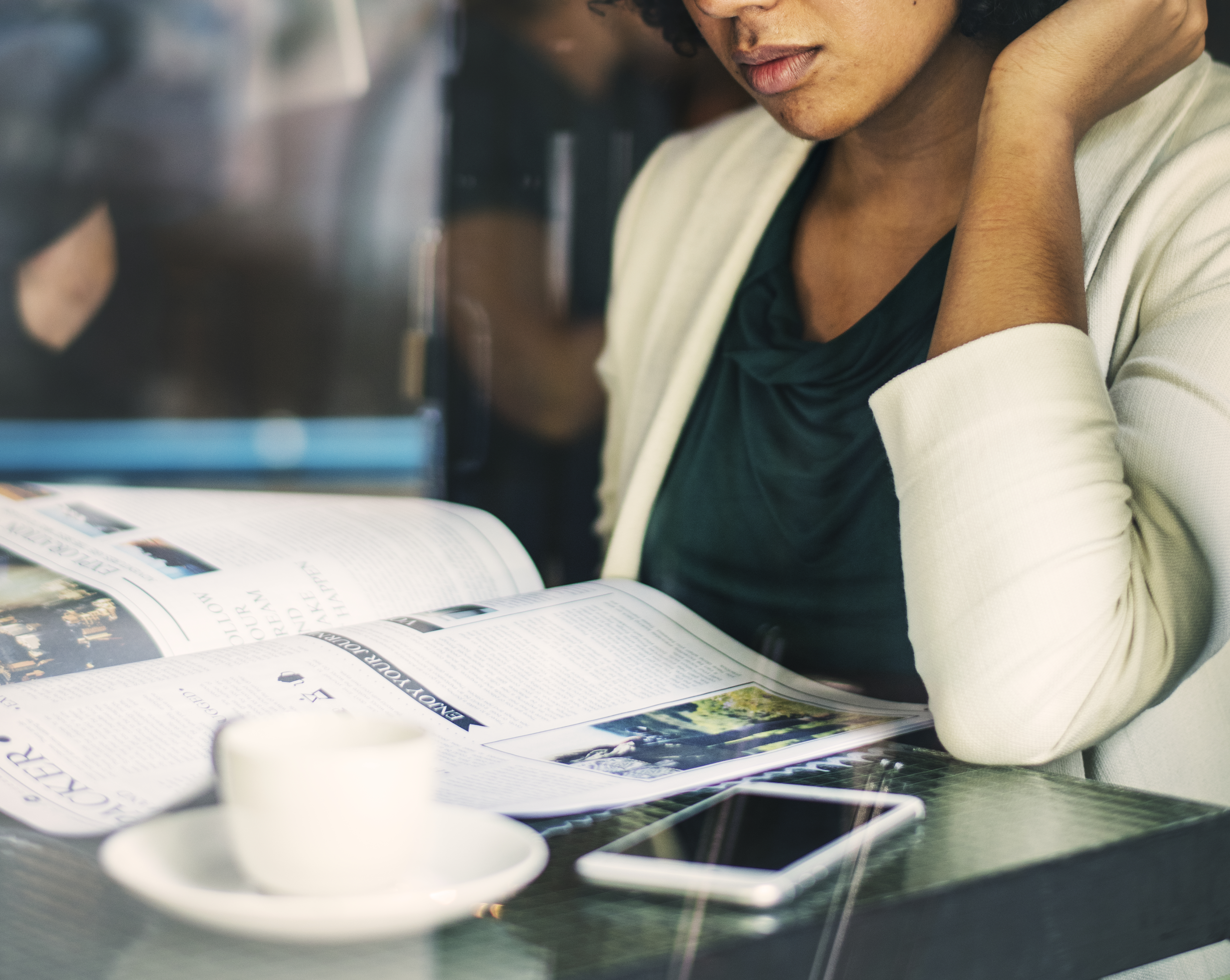 businesswoman reading daily news