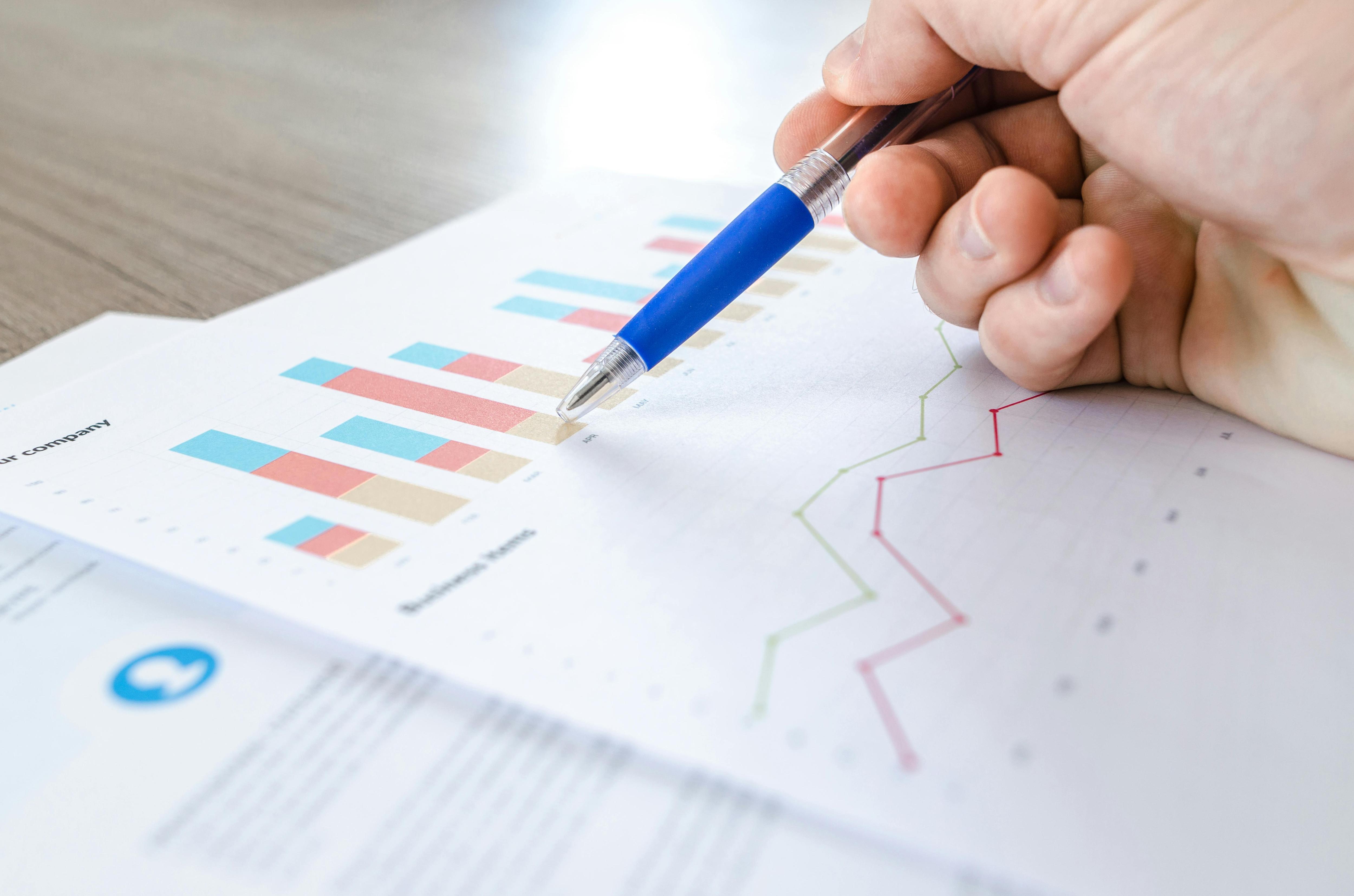 A close up image of a sheet of paper containing data graphs