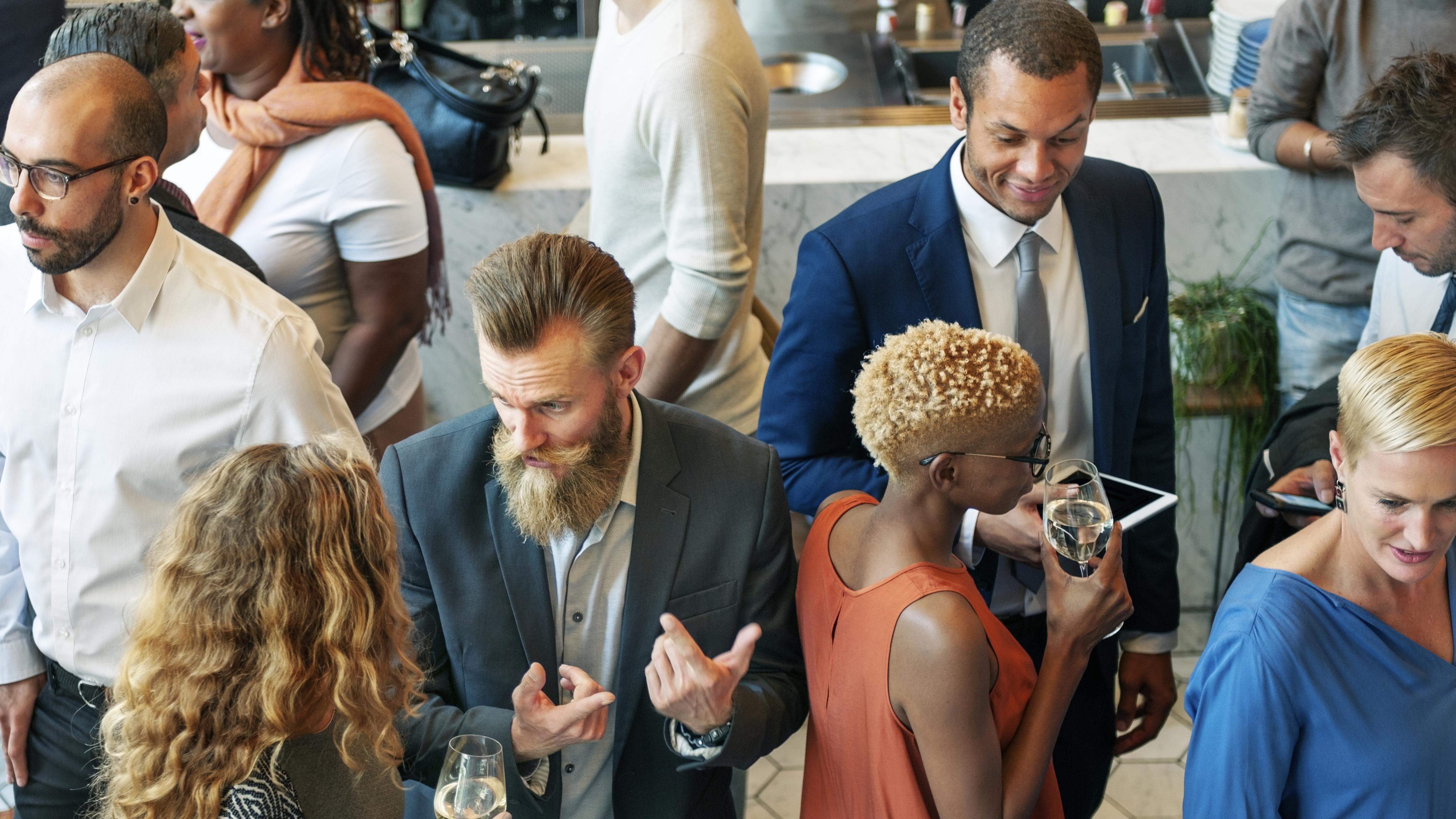 Diverse business people at a dinner party