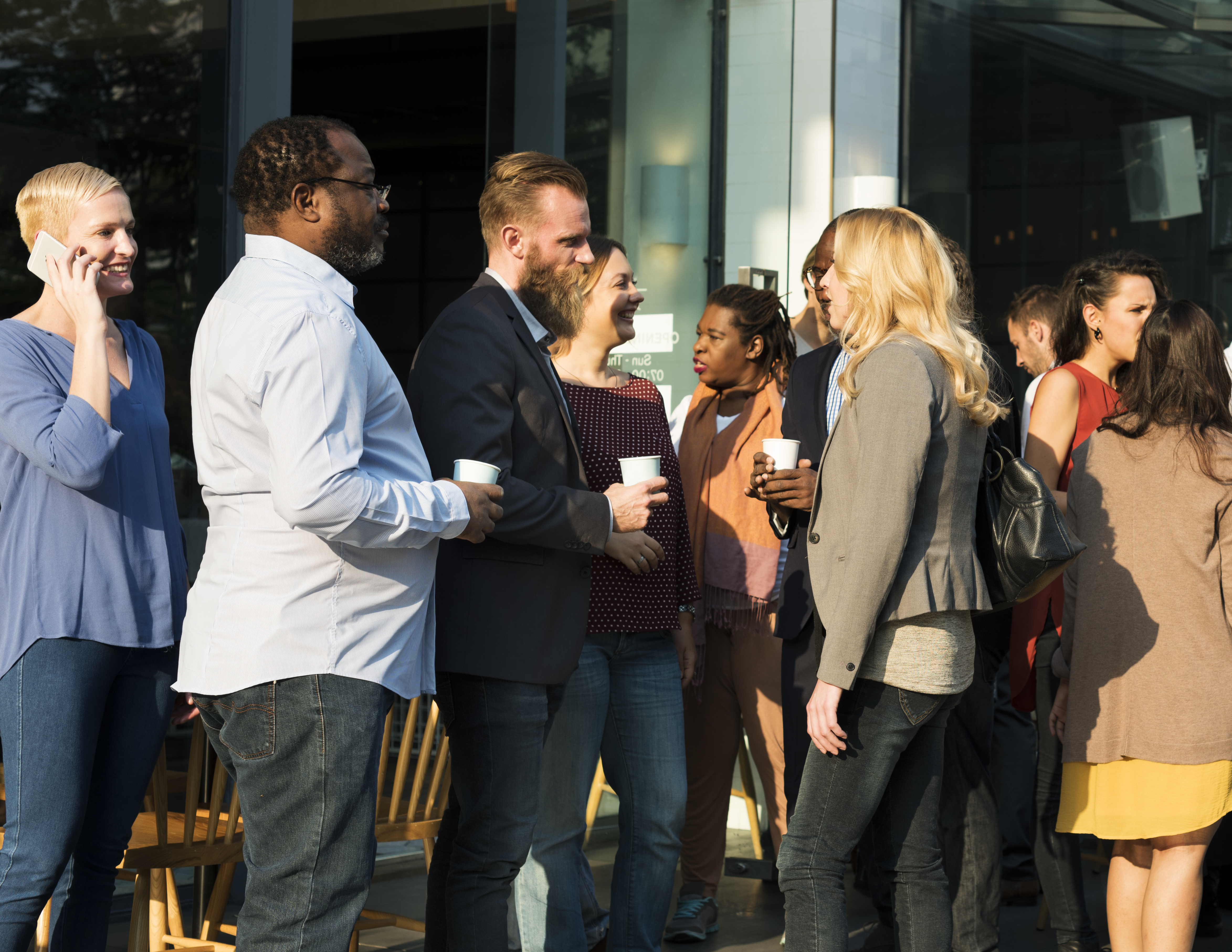 Groups of people at a networking event.